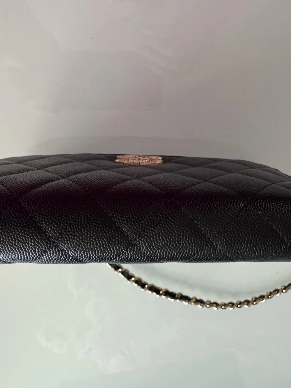 CHANEL WOC Black caviar leather with Gold Hardware and heart shaped crystal logo